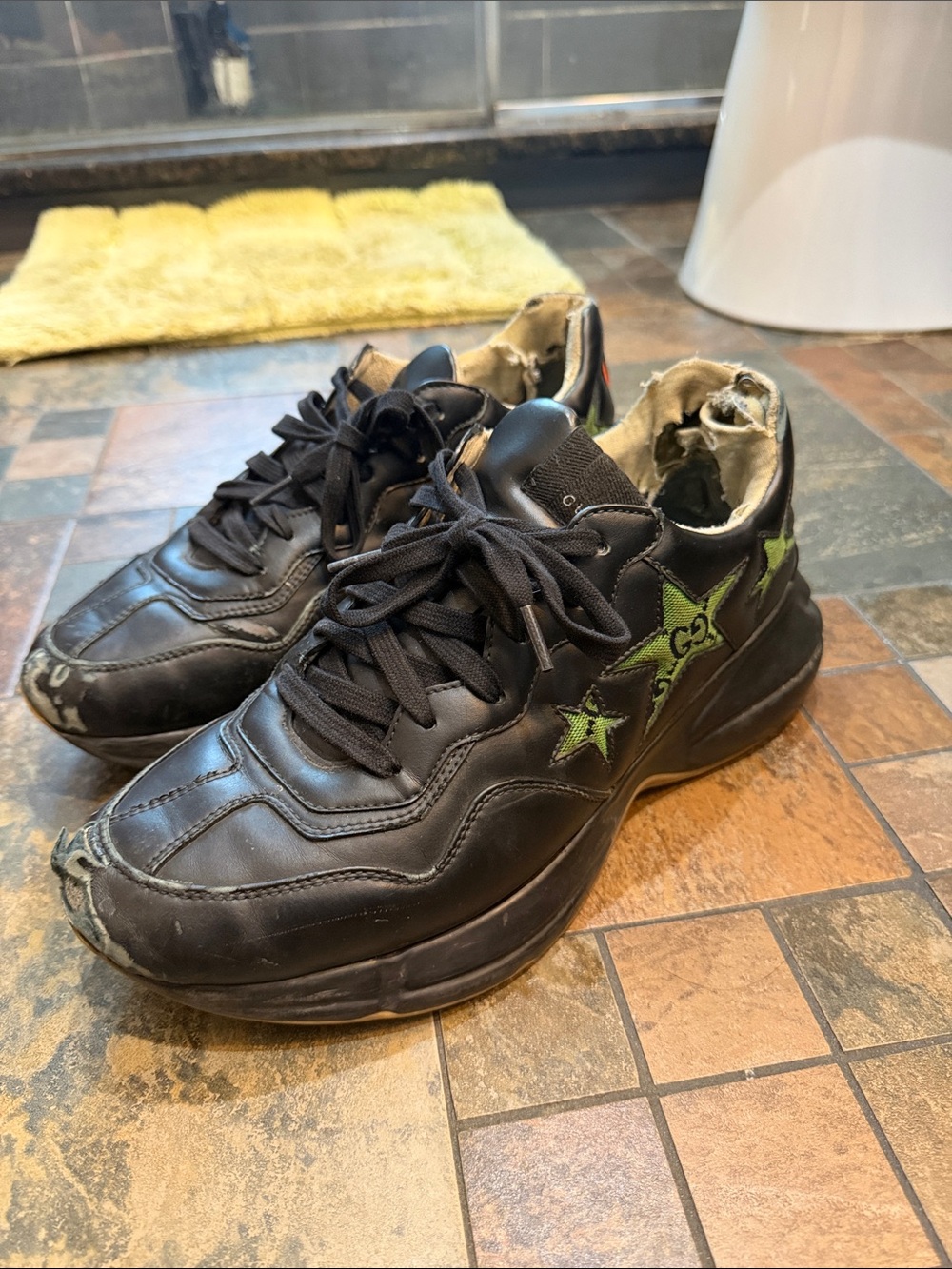 Black Leather Gucci Sneakers with Green Star Accents
